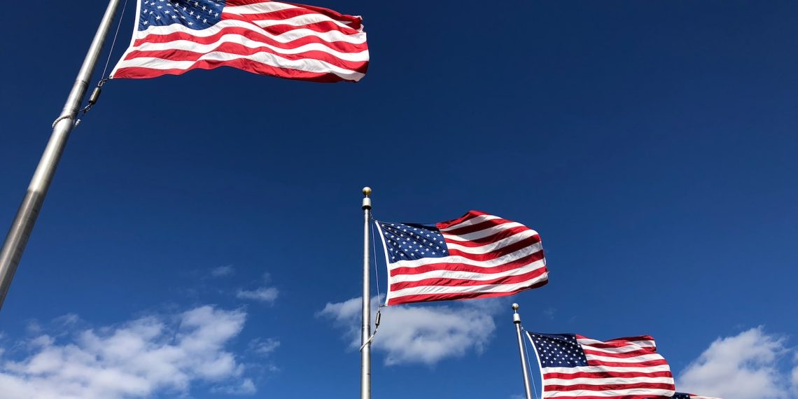 U.S. American flags under clear sky